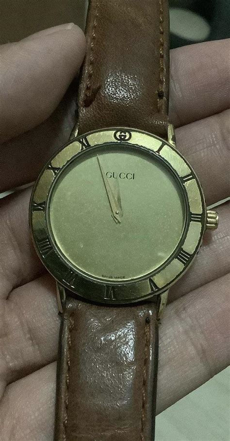 gucci watch identification check.